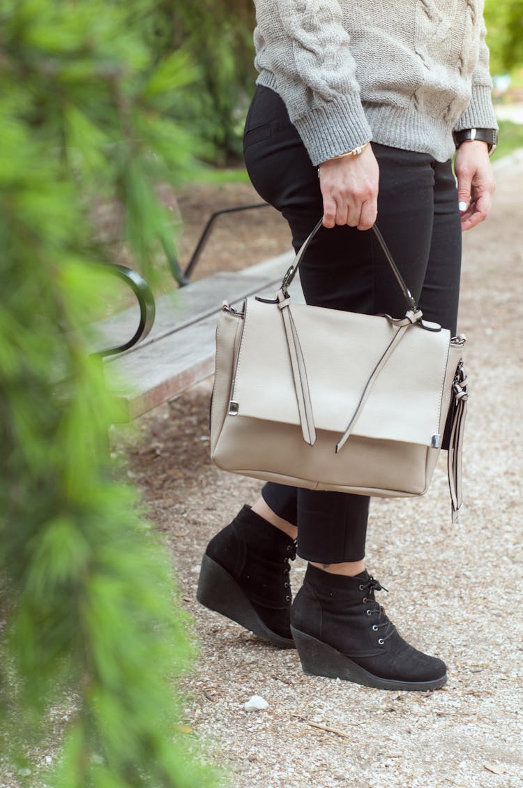 Hand Holding Handbag