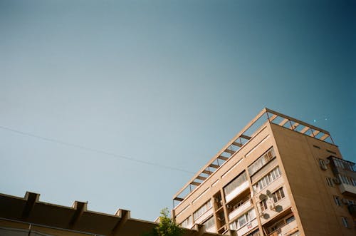 Brown Concrete Building Under A Clear Sky