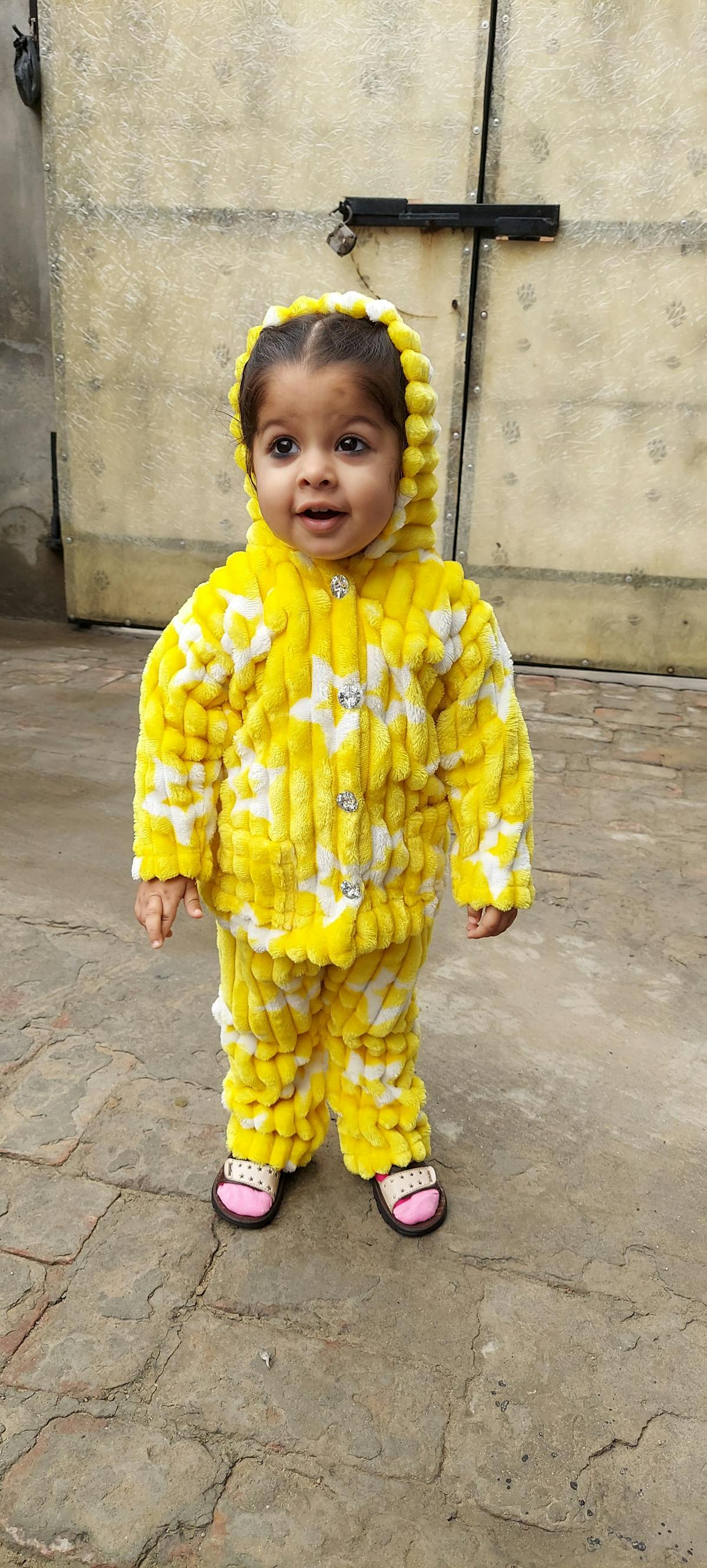 Latte served with a light breakfast of fruit and toast on a wooden tray