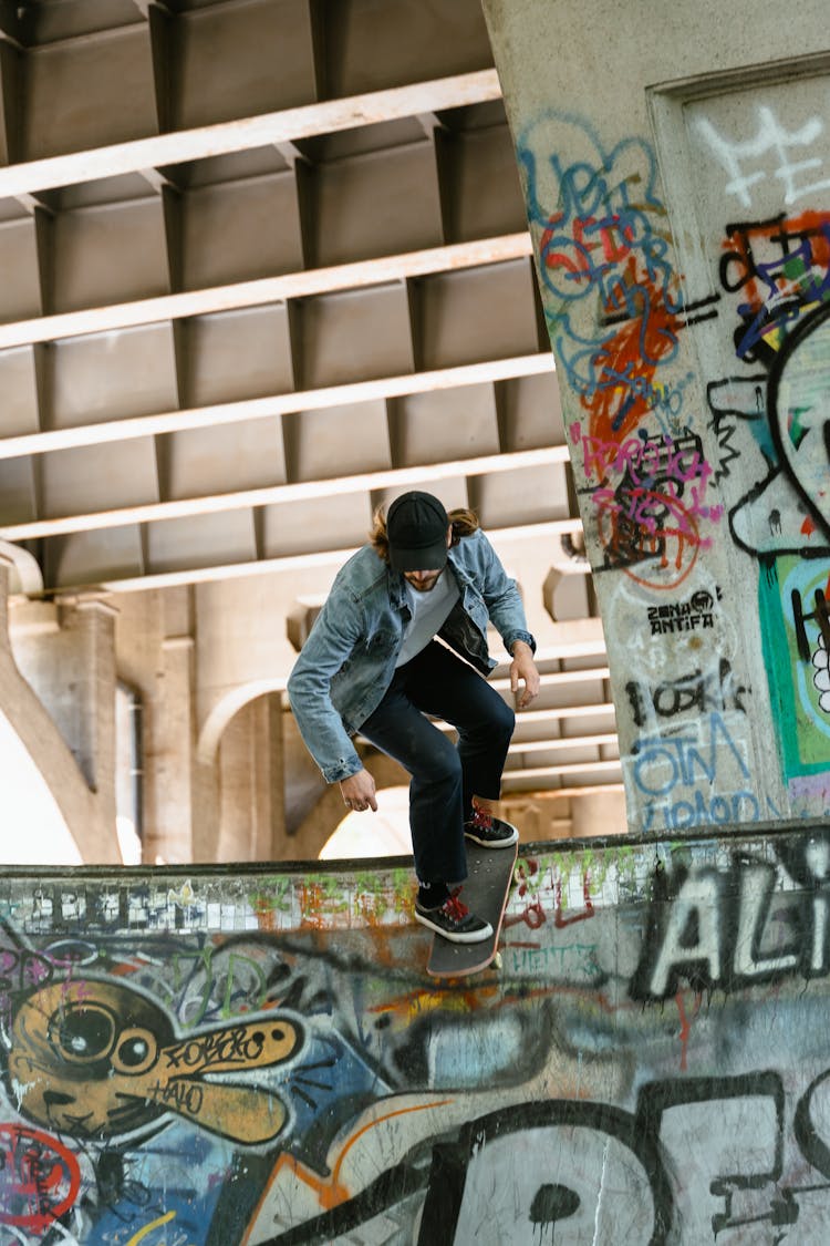 Man Doing A Skateboarding Stunt