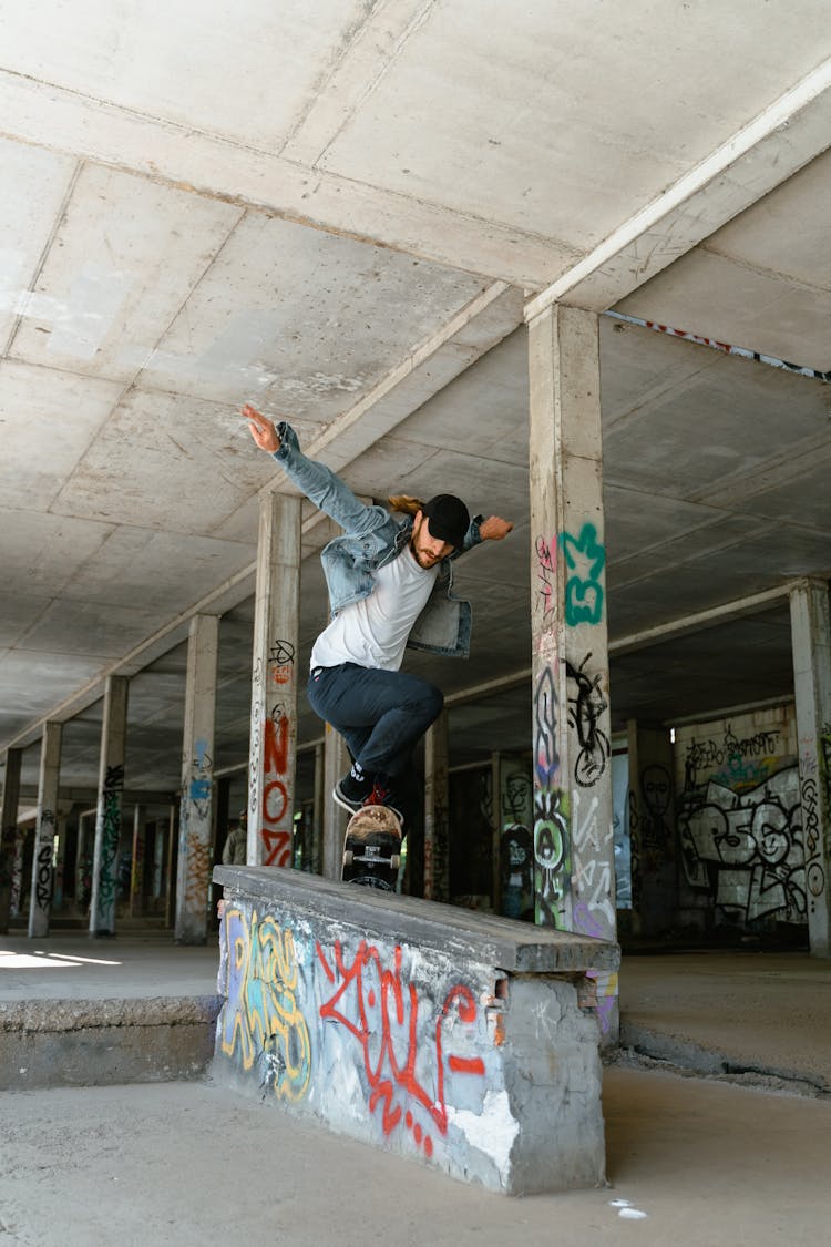 Man Skateboarding On A Concrete Railing