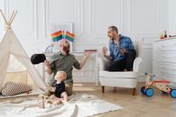 Men with Their Baby in the Living Room