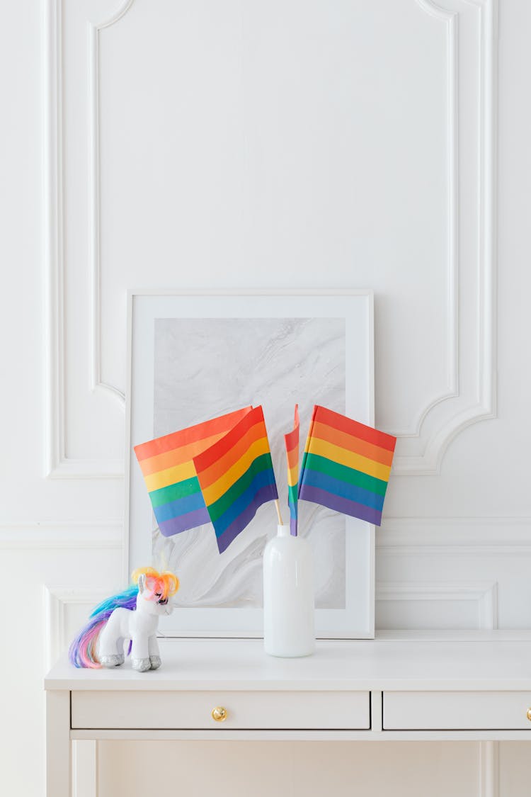 Paper Rainbow Flags In Porcelain Vase