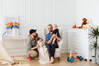 A Couple Playing with their Baby