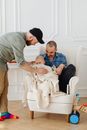 A Couple Taking Care of Their Baby