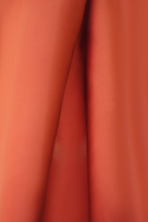 Close-Up Shot of Orange Textile
