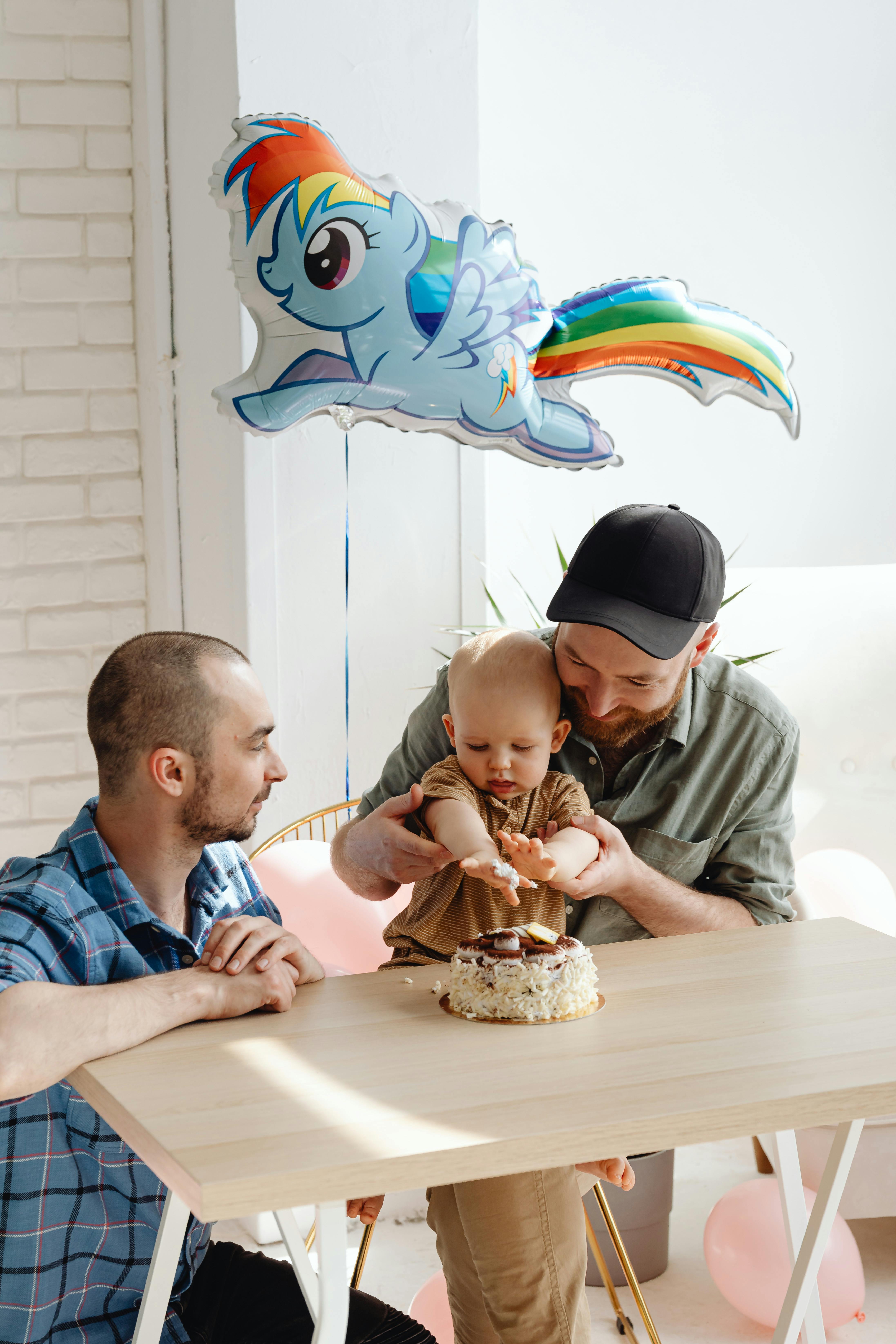 a same sex couple celebrating their son s birthday