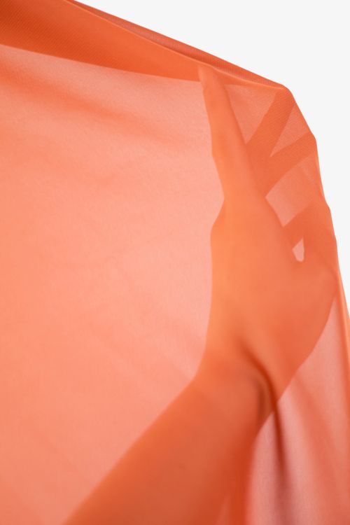 Hand Stretching Translucent Red Fabric · Free Stock Photo