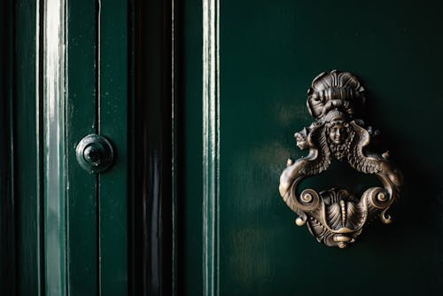 Antique Brass Handle On Green Door