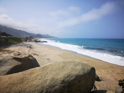 Free stock photo of beach, beach sand, boulders