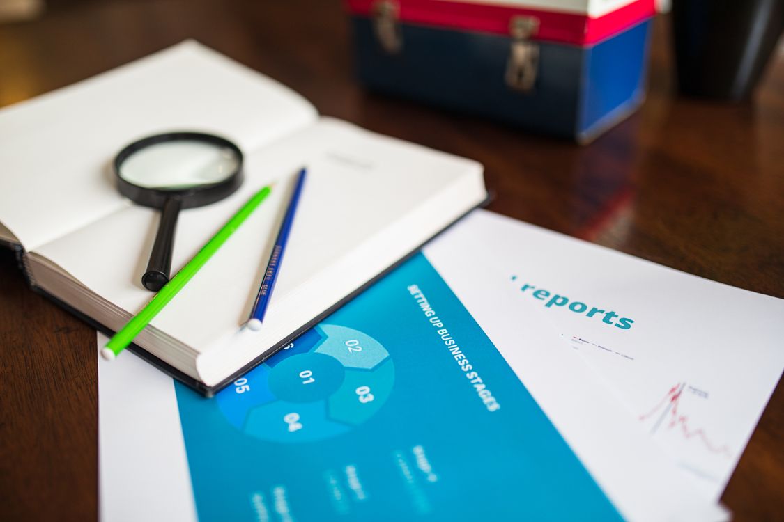 Person reviewing property documents and contract at a desk — foreigner buying property in Vietnam legal guide