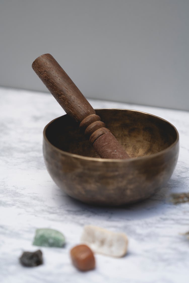 A Singing Bowl On A Flat Surface