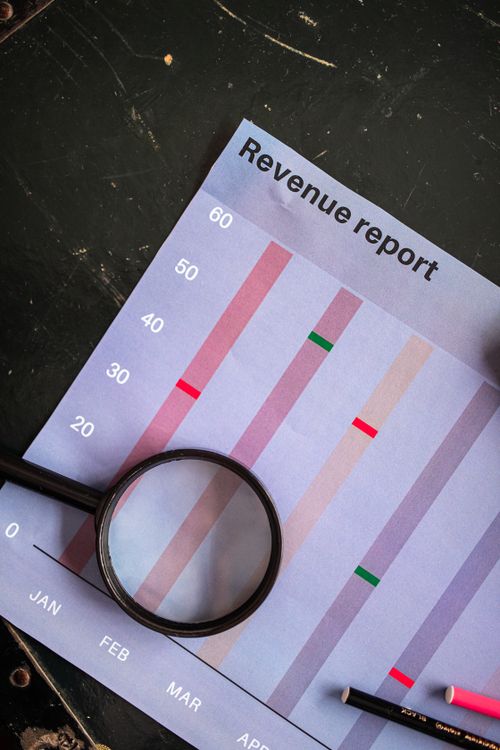 magnifying glass chart data analytics SEO