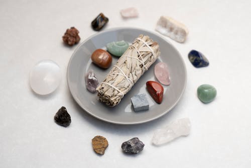 White Sage and Stones on Ceramic Plate