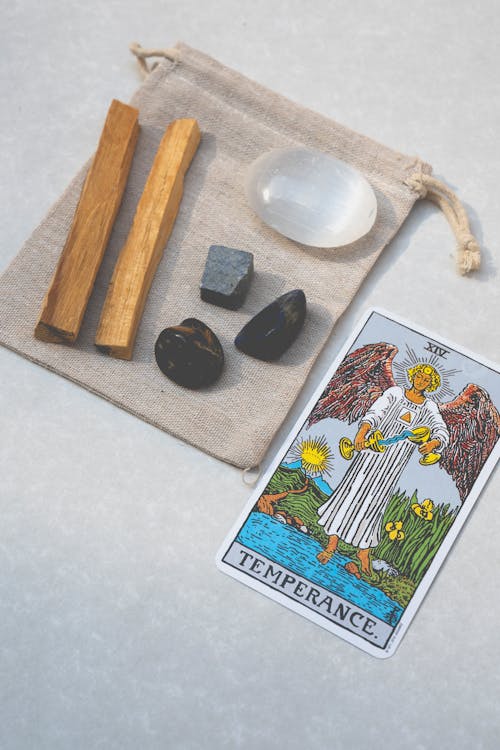 Alternative Medicine beside a Tarot Card
