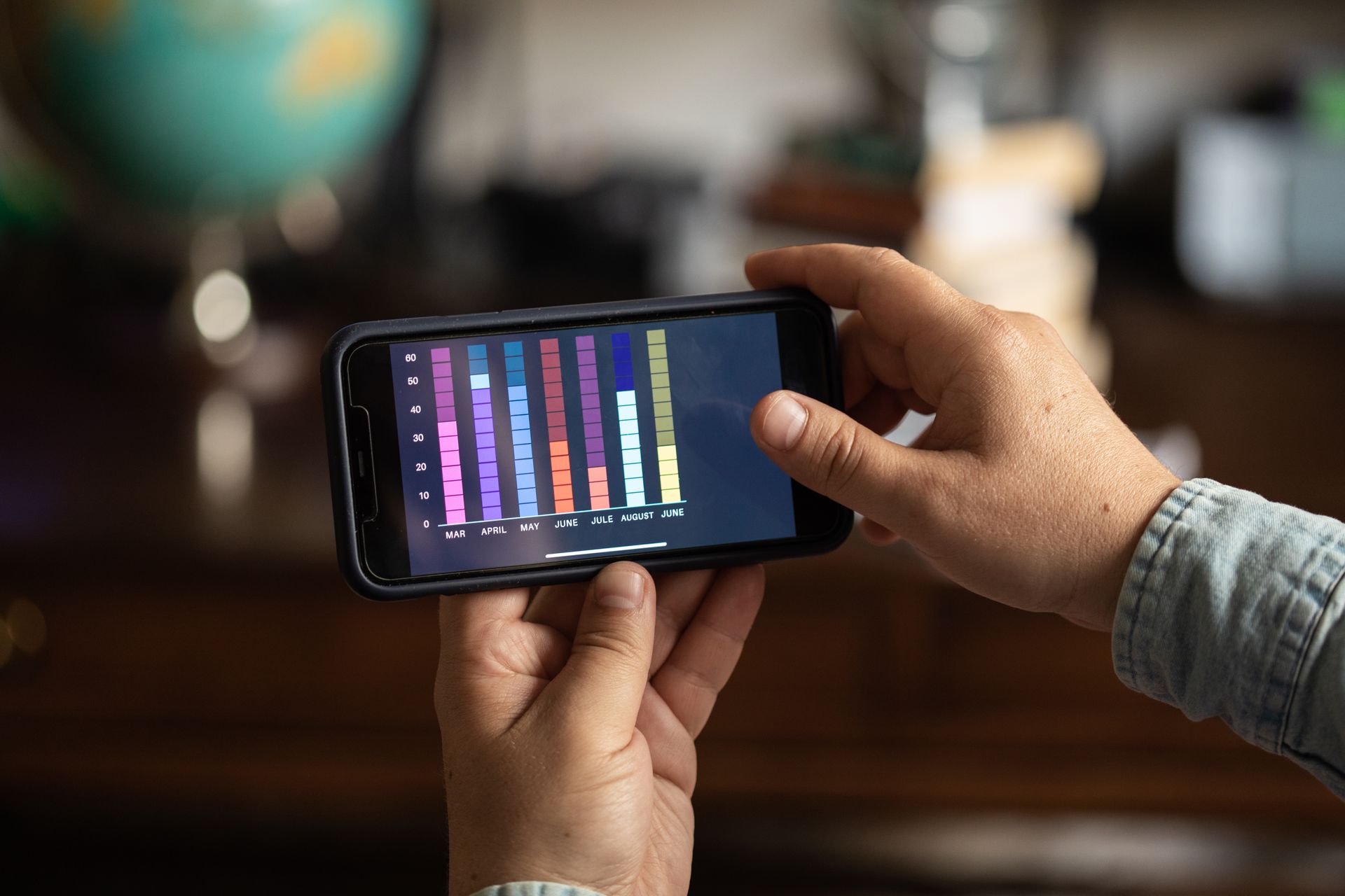 Close-Up Shot of a Person Holding a Smartphone
