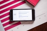 Black Smartphone on White Paper