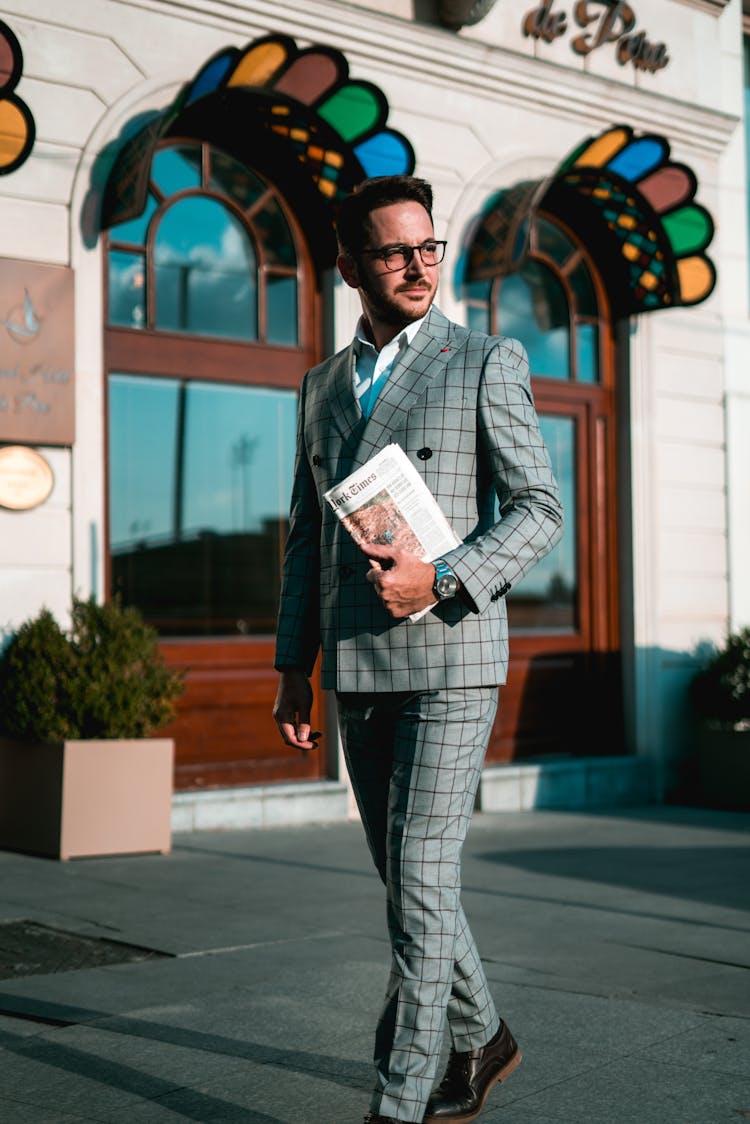 A Man In A Plaid Suit 