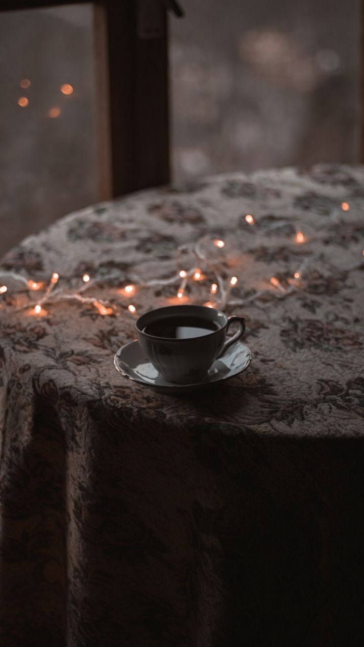 Warm LED fairy lights draped along a dollar tree coffee bar design for ambient lighting