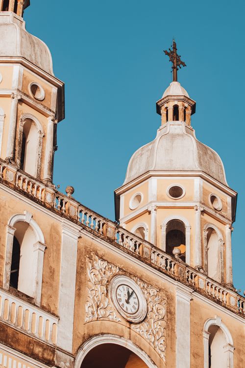 Free Stunning view of the twin towers of a historic church under a clear blue sky in Florianopolis. Stock Photo