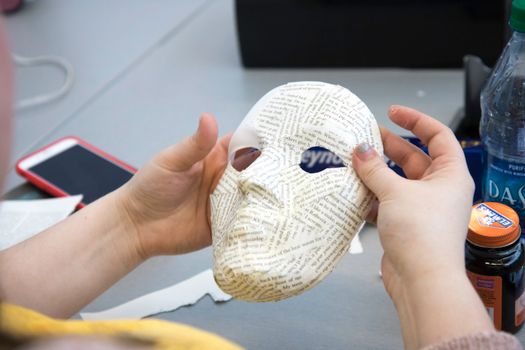 Person Holding a Mask