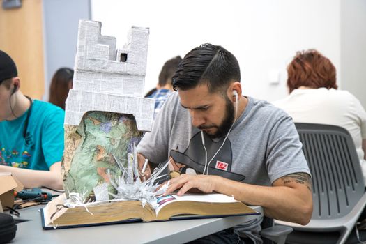 Man Making a School Project
