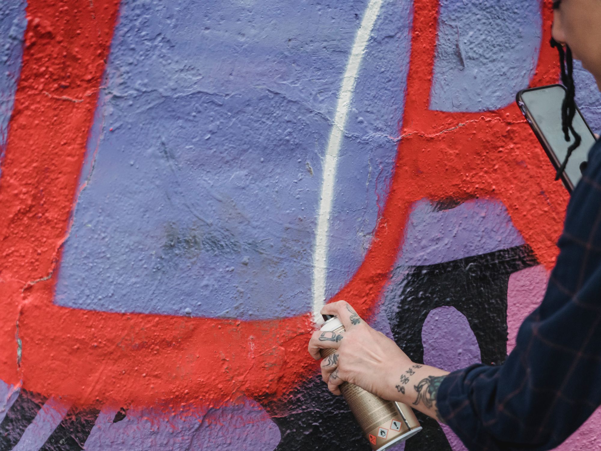 Exterior Painting in Erith, Bexley — painter refreshing a house exterior in weatherproof paint