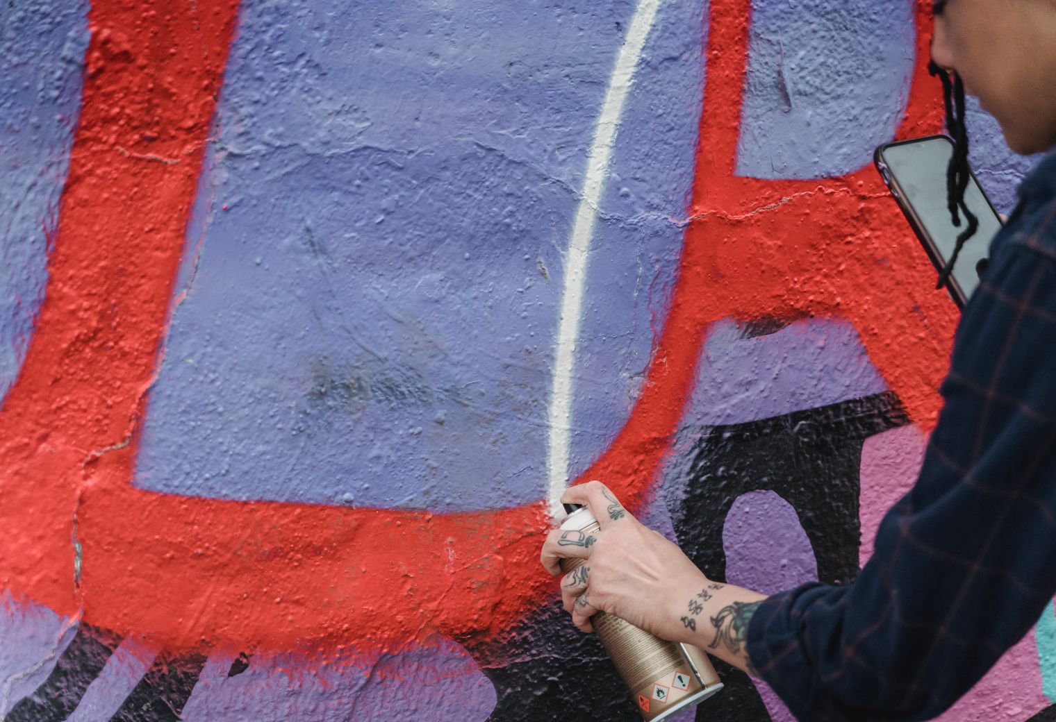Painters and Decorators in Spitalfields — a decorator at work mid-project