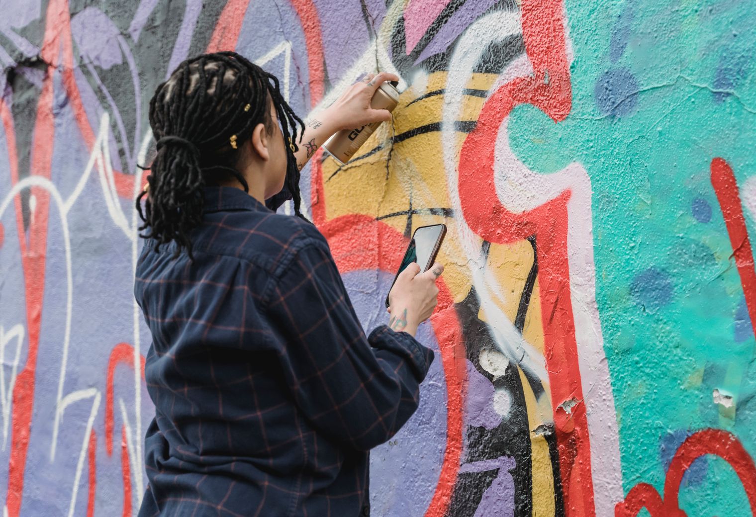 Exterior Painting in Belmont — a decorator at work mid-project