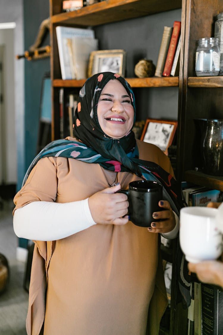 Woman Holding A Mug