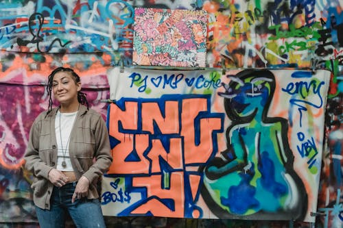 Woman Standing Near Graffiti Art