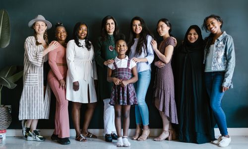 Joyful group of diverse women standing together