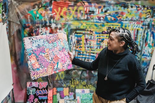 Woman Showing Graffiti Painting