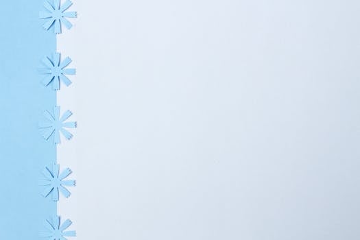 Simple blue and white paper with decorative cutouts offering a clean and modern look.