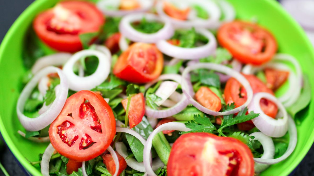 Tomato, red onion and coriander salad
