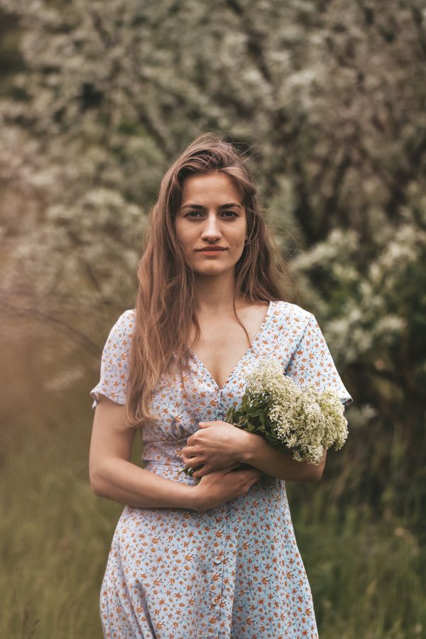 Woman in a floral midi wrap dress outdoors