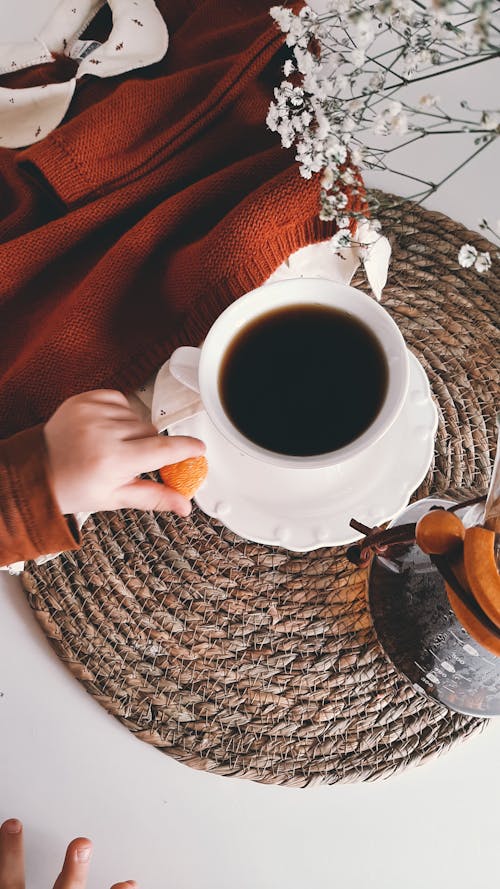 A Cup of Coffee on a Ceramic Saucer