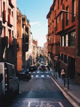 Capturing the vibrant architecture and city life on a sunny day in Barcelona, Spain.