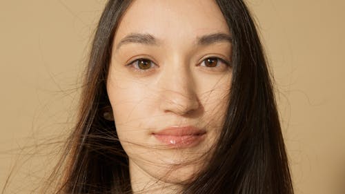 Close-Up Photo of a Woman's Face