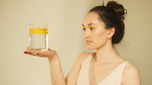 Glass on Woman's Palm