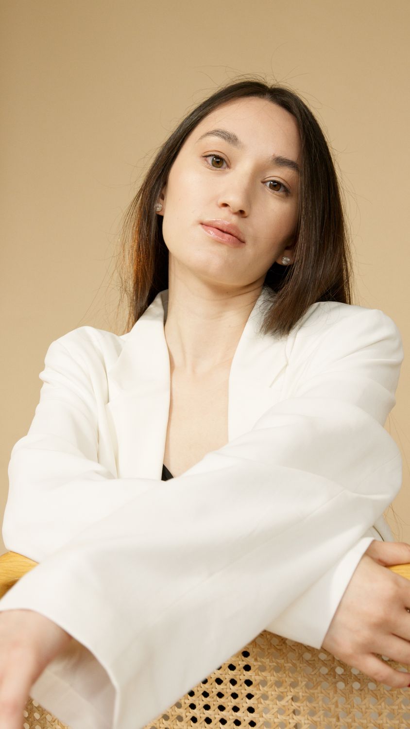 Woman in White Blazer Seriously Looking at the Camera · Free Stock Photo
