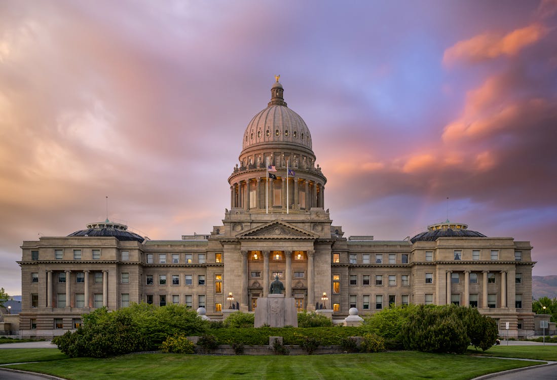 Free Exterior of famous Idaho State Capitol building located in America under colorful sky at sunrise Stock Photo