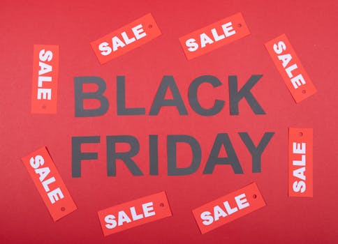 Black Friday sale promotion with red tags on a red background. Ideal for advertising.