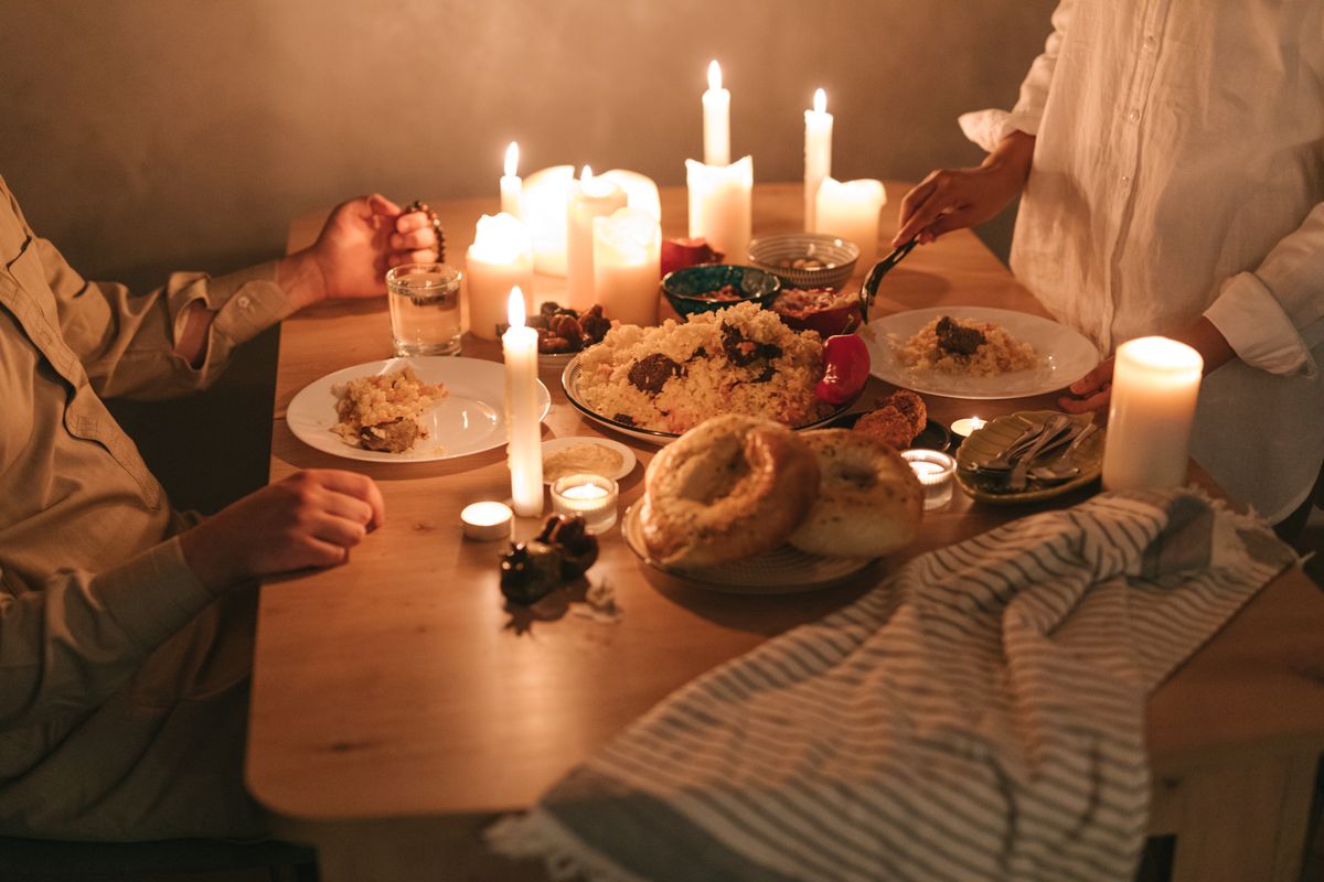 Intimate couple candlelit — sensory connection and desire