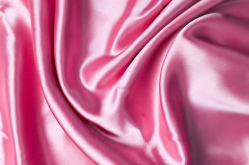 A Close-Up Shot of a Pink Satin Fabric