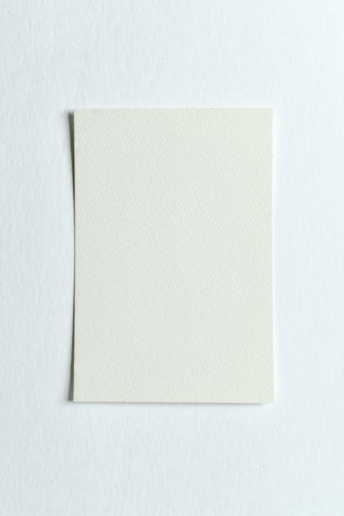 Free White Paper on White Surface Stock Photo