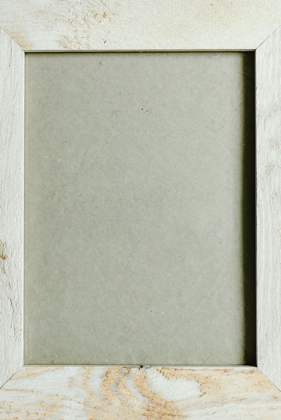 A worn wooden empty frame