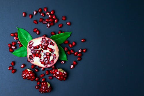 Pomegranate on Blue Background