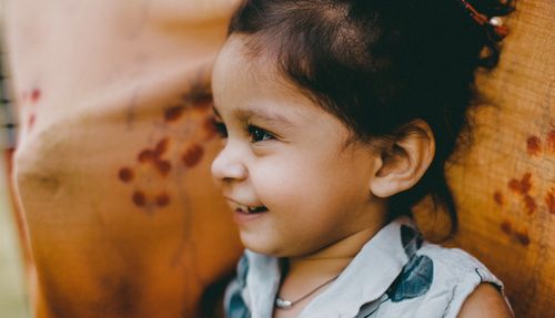 Free A cute child smiling with a joyful expression, showcasing innocence and happiness. Stock Photo