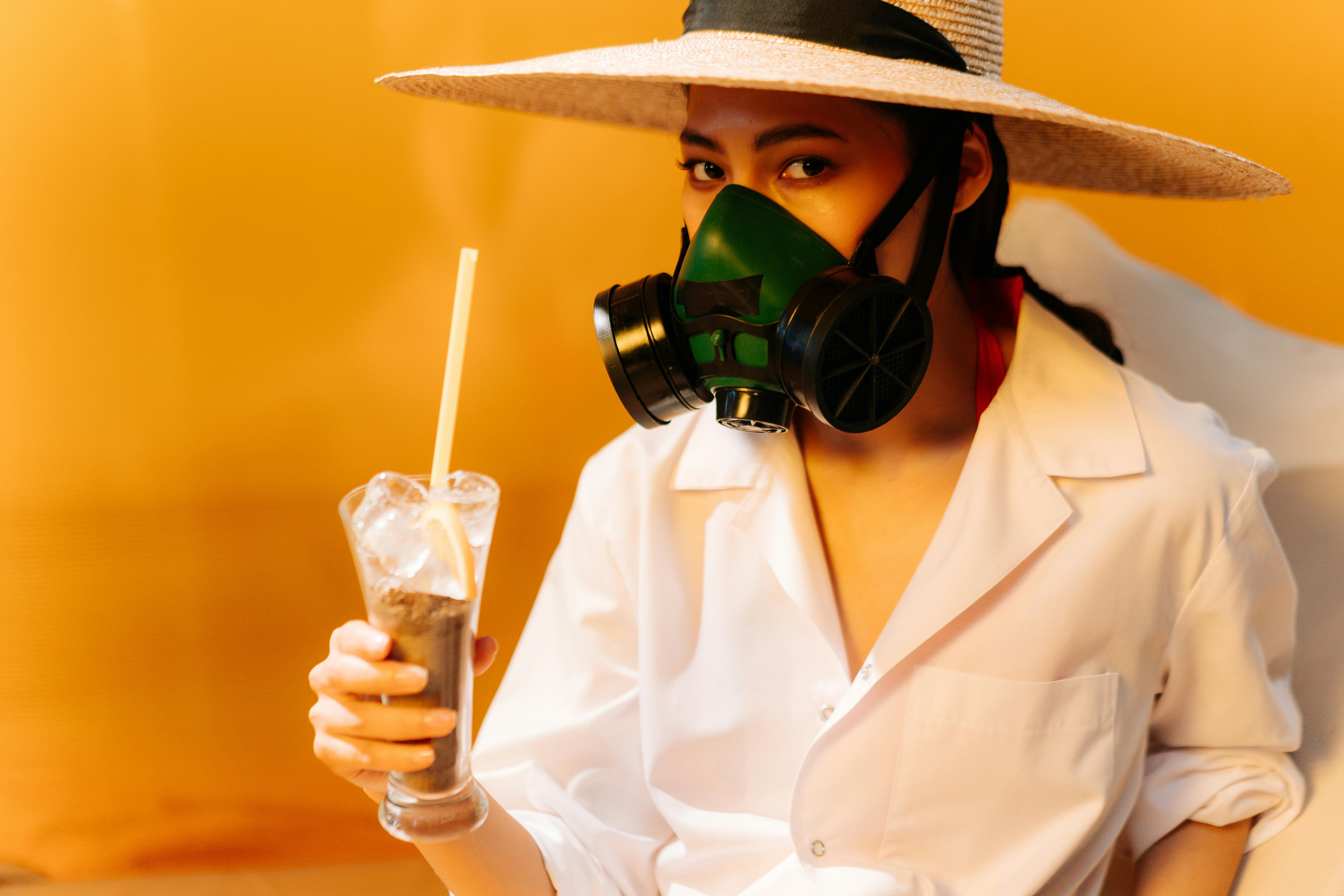A Woman Wearing a Respirator Mask · Free Stock Photo